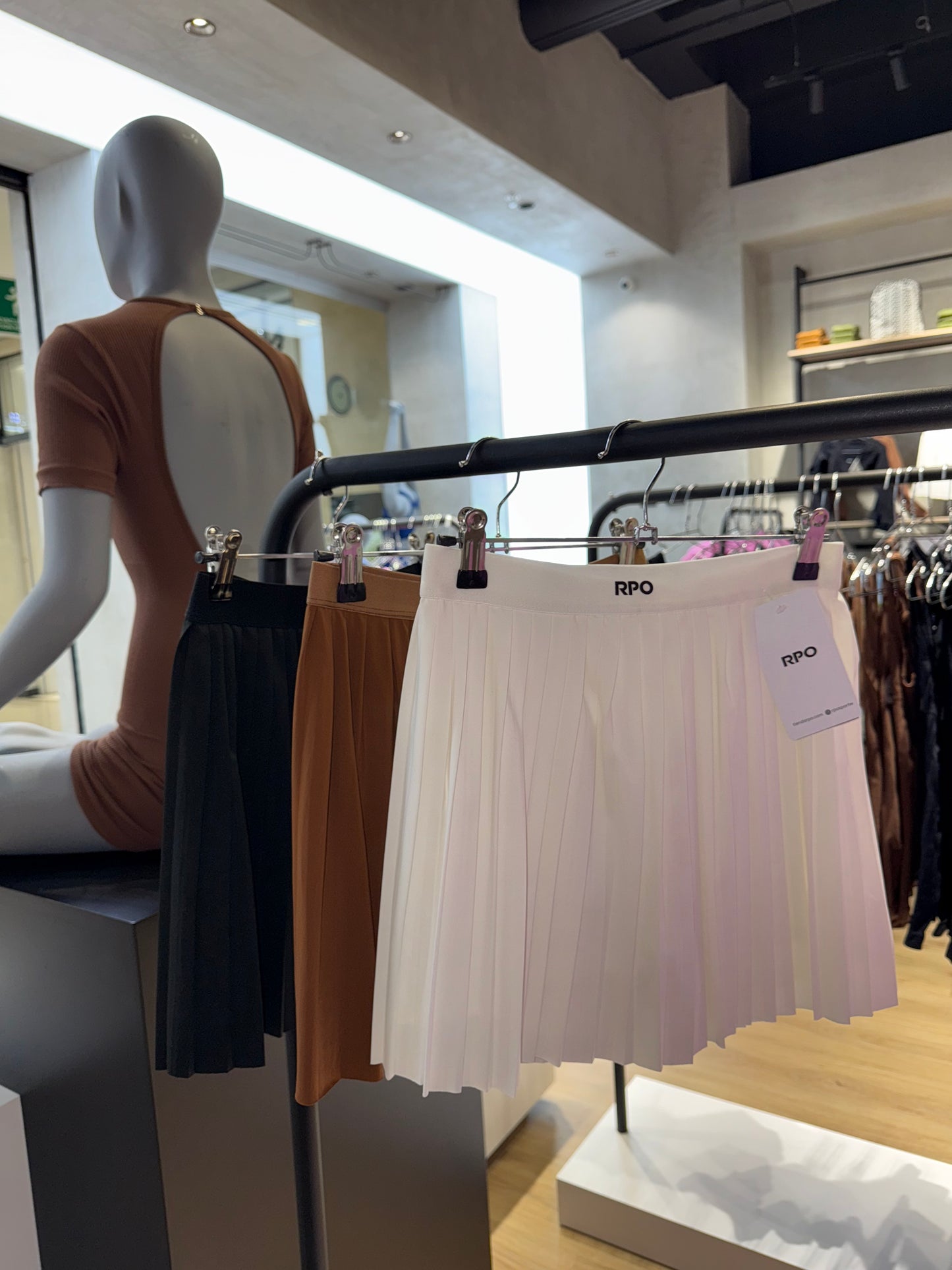 Falda short sport plizada