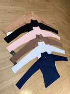 Buzo cuello tortuga largo