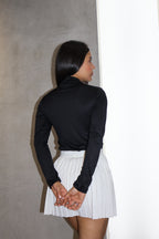 Buzo cuello tortuga largo