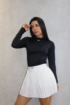 Buzo cuello tortuga largo