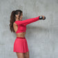 Falda short sport plizada