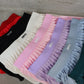 Falda short sport plizada